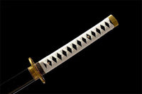 Decorative sword handle with geometric pattern on a black background