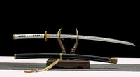 Two swords on a stand with a black background